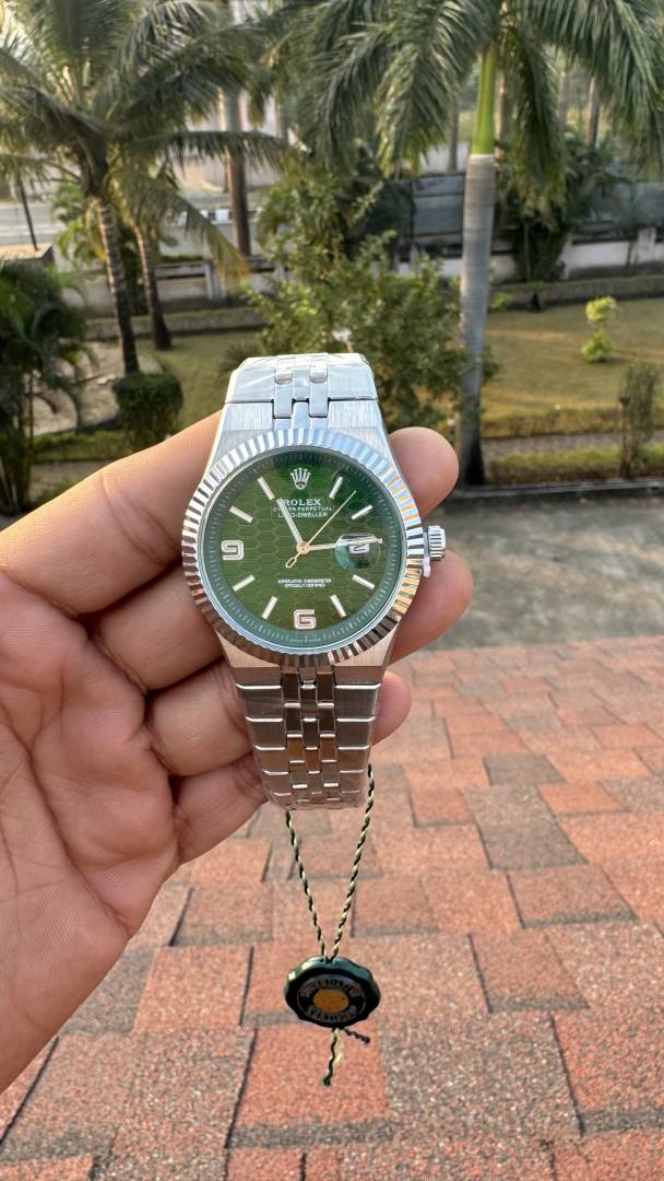 Rolex Land Dweller Silver Green Dial